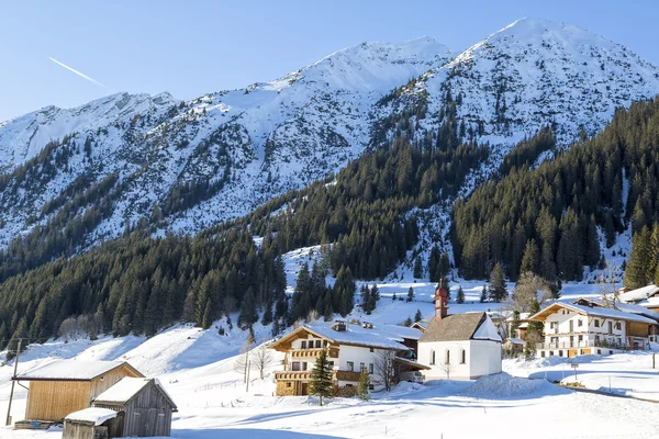 Alpine road in winter scenery — Stock Photo, Image