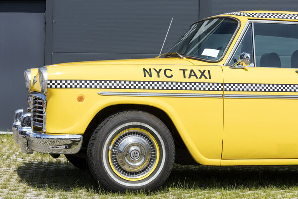 Munich, Germany - June 25,2016 Iconic vintage yellow Checker taxi cab well known among other things from the movie "Taxi Driver".