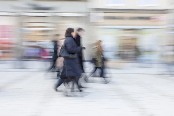 Happy shopping, people walking, motion blur — Stock Photo, Image