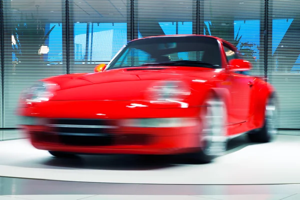 Red Sports Car on Rotating Platform 2569 — Stock Photo, Image