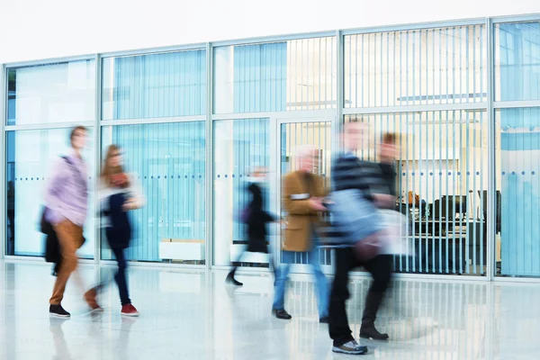 Silhouettes of People Walking in Office Building — Stock Photo, Image