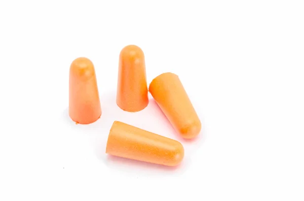 Orange earplugs with a string on white background. — Stock Photo, Image