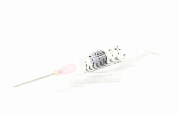 Syringe on white background. — Stock Photo, Image