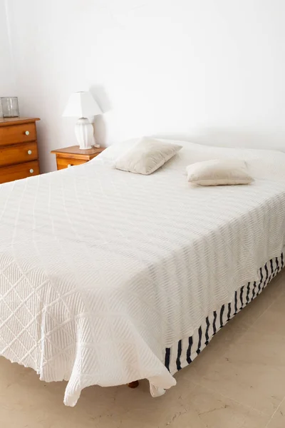 White bedroom decor creating a clean and comfortable home environment