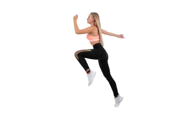 Sporty Young Woman Pink Top Leggings Sneakers Does Exercises White — Stock Photo, Image