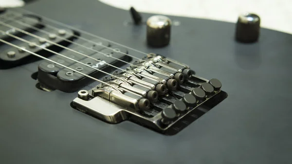 Černá elektrická kytara — Stock fotografie