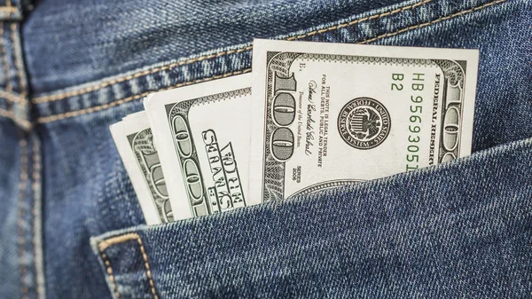 Some dollar bills in jeans pocket — Stock Photo, Image