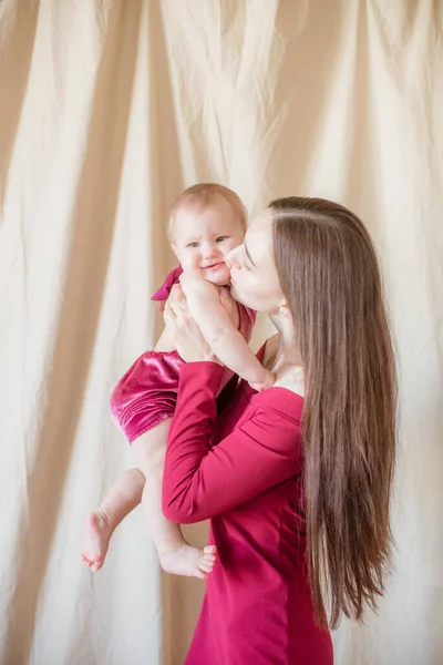 Young Mother Long Dark Hair Burgundy Dress Baby Her Arms — Stock Photo, Image