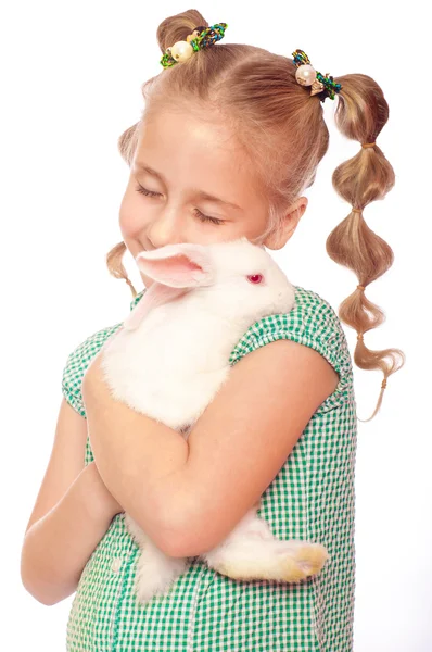 Little girl with a white rabbit in  her hands — Stock Photo, Image