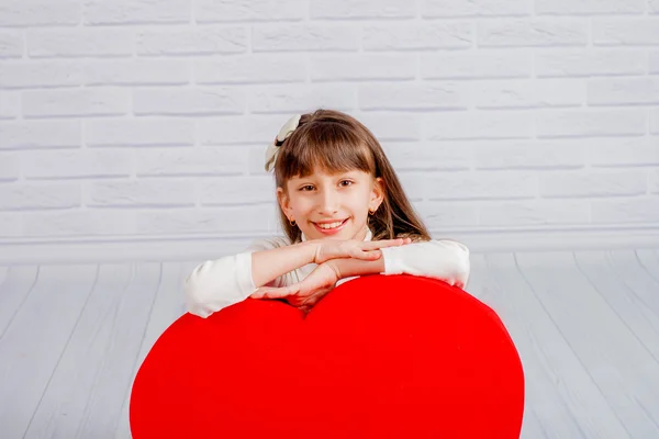 Little girl with a big  heart — Stock Photo, Image