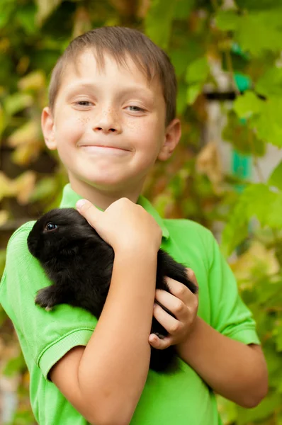 The little boy with a rabbit in the hands — Stock Photo, Image