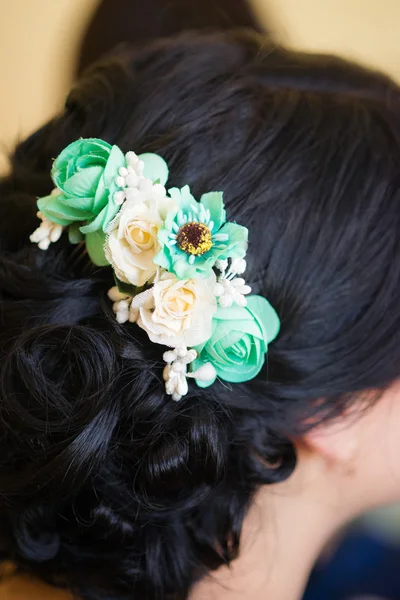 Bride hairstyle with flowers in hair — Stock Photo, Image