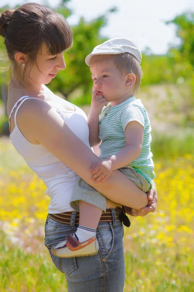 Young mother with her baby son — Stock Photo, Image