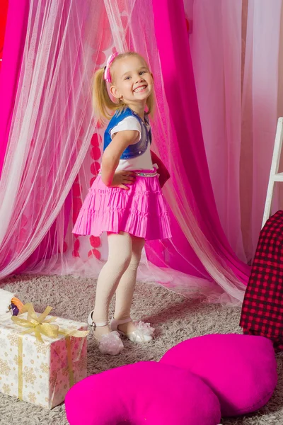 Little girl in a  pink skirt — Stock Photo, Image