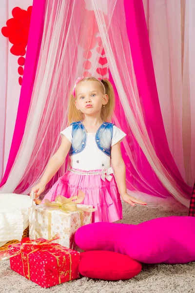 Little girl in a pink skirt — Stock Photo, Image