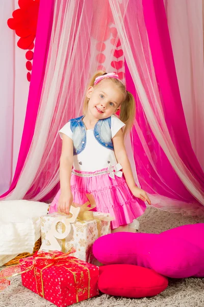 Little girl in a  pink skirt — Stock Photo, Image