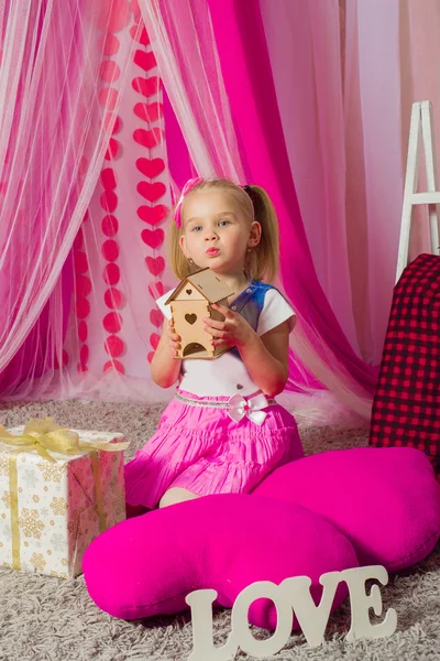 Little girl in a  pink skirt — Stock Photo, Image