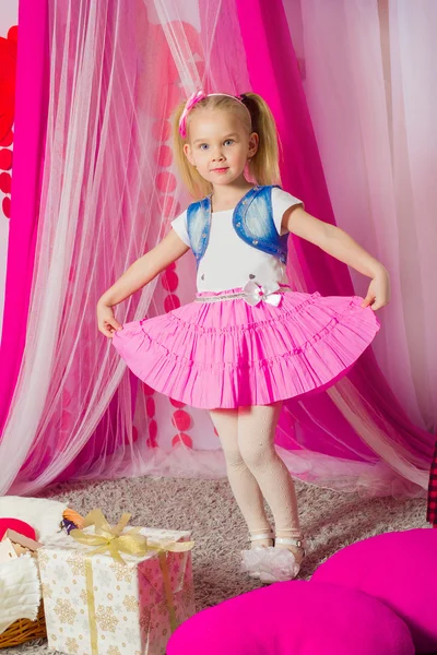 Little girl in a pink skirt — Stock Photo, Image