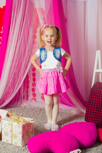Little girl in a pink skirt — Stock Photo, Image