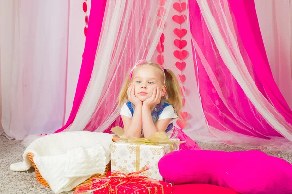 Little girl in a pink skirt — Stock Photo, Image