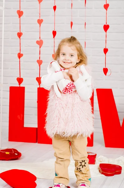 Little girl with  decoration Valentine's Day — Stock Photo, Image