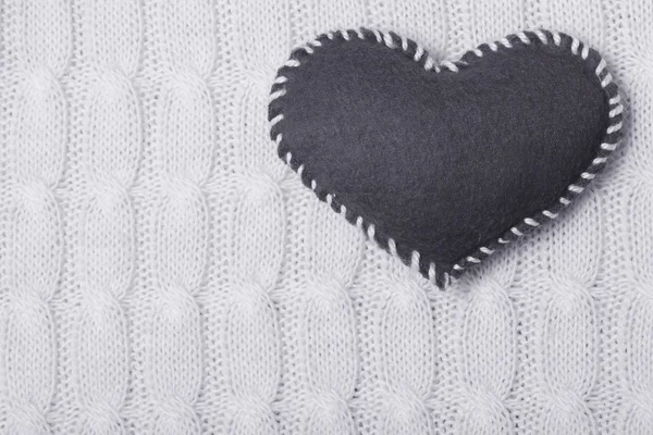 Corazón textil en textura de punto blanco —  Fotos de Stock