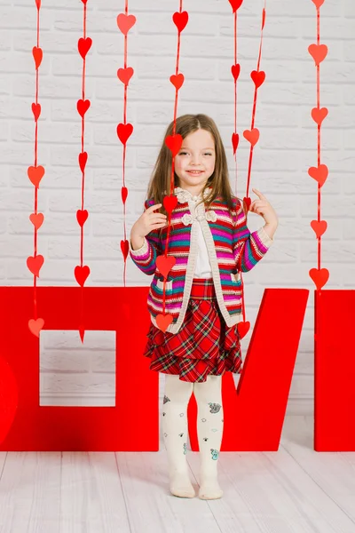 Niña con decoración para el día de San Valentín —  Fotos de Stock