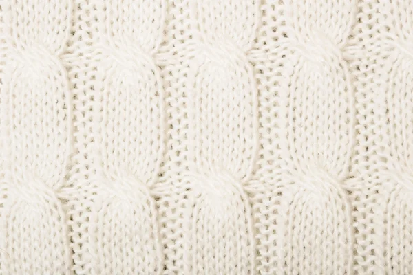 Bílý pletený textury s ornamenty — Stock fotografie