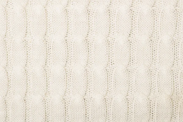 White knitted texture with ornament — Stock Photo, Image