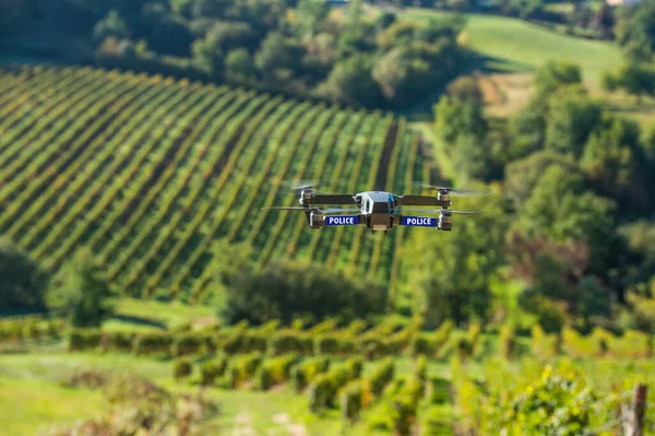 Police unmanned aircraft system, Drone flying above a landscape