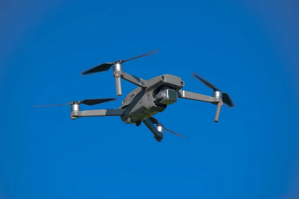 Police unmanned aircraft system, Drone flying, blue sky background