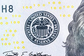 Symbol des Federal Reserve Systems auf dem 100-Dollar-Schein Nahaufnahme mac