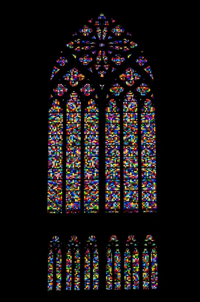 Colored mosaic stained glass window of gothic church — Stock Photo, Image