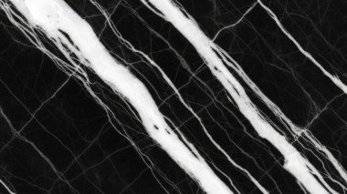 Doğal desenli siyah mermer arkaplan.