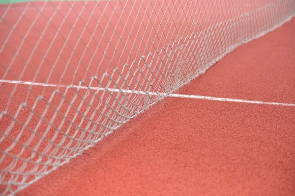 赤い顆粒ラバース トラップみっしぃから作られたフィールドで純テニスの詳細です。セレク — ストック写真