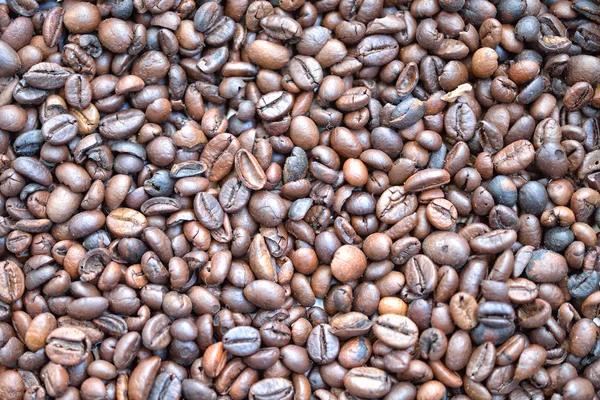Granos de café tostados para el fondo —  Fotos de Stock