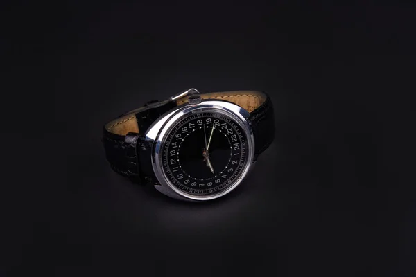 Classic wristwatch for man on black — Stock Photo, Image