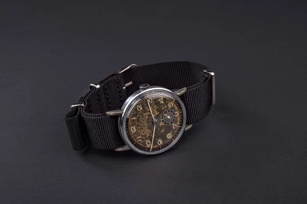 Old classic wristwatch for man on black Royalty Free Stock Photos