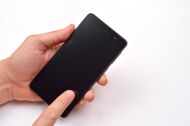 Close up shot of a man holding a modern smartphone and pointing 