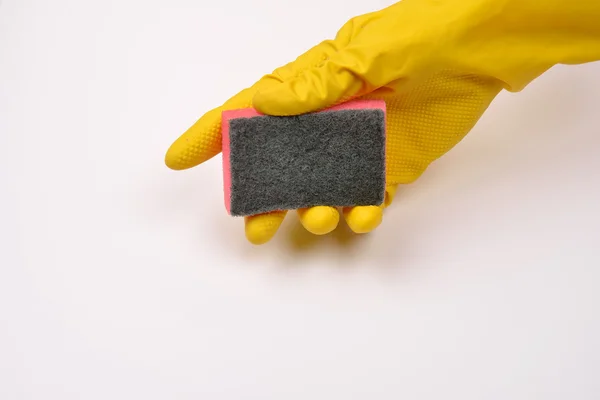 Women protecting hand with rubber glove from detergents as they — Stock Photo, Image