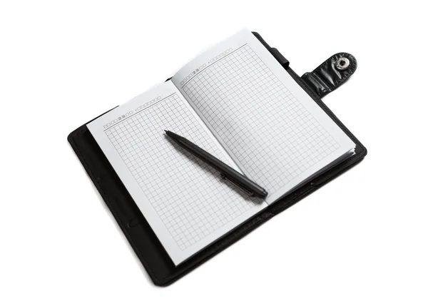 Blocco note e penna isolato su sfondo bianco — Foto Stock