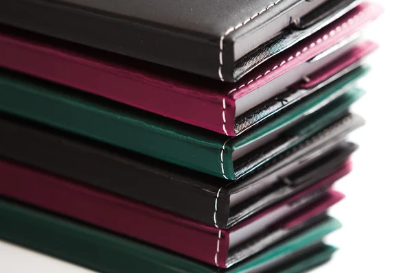 Kleurrijke stapel van notebooks close-up — Stockfoto