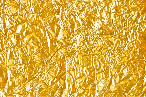 Textur der Goldfolie — Stockvektor