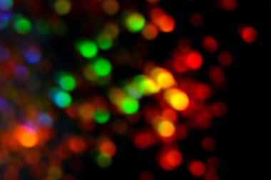 Bulanık ışıkların arka planı mavi, yeşil ve kırmızı.