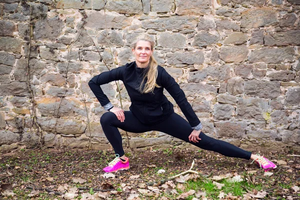 Woman stretching her body — Stock Photo, Image