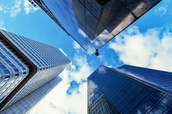 Moving clouds above skyscrapers — Stock Photo, Image