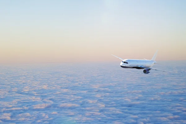 Plane flying above cloudscape — Stock Photo, Image