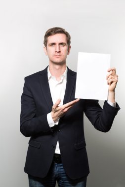 studio shot of thoughtful businessman
