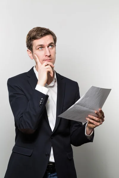 Studio shot of thoughtful businessman — Stock Fotó