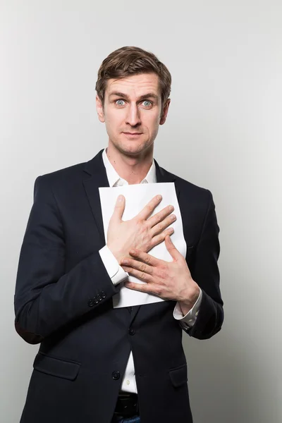 studio shot of thoughtful businessman